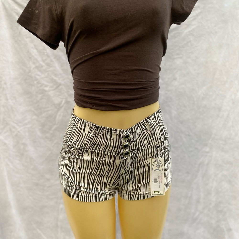 GLORY WOMEN AND GIRLS FASHION SHORT SHORTS. ZEBRA PRINT WITH 3 BLACK BUTTONS.